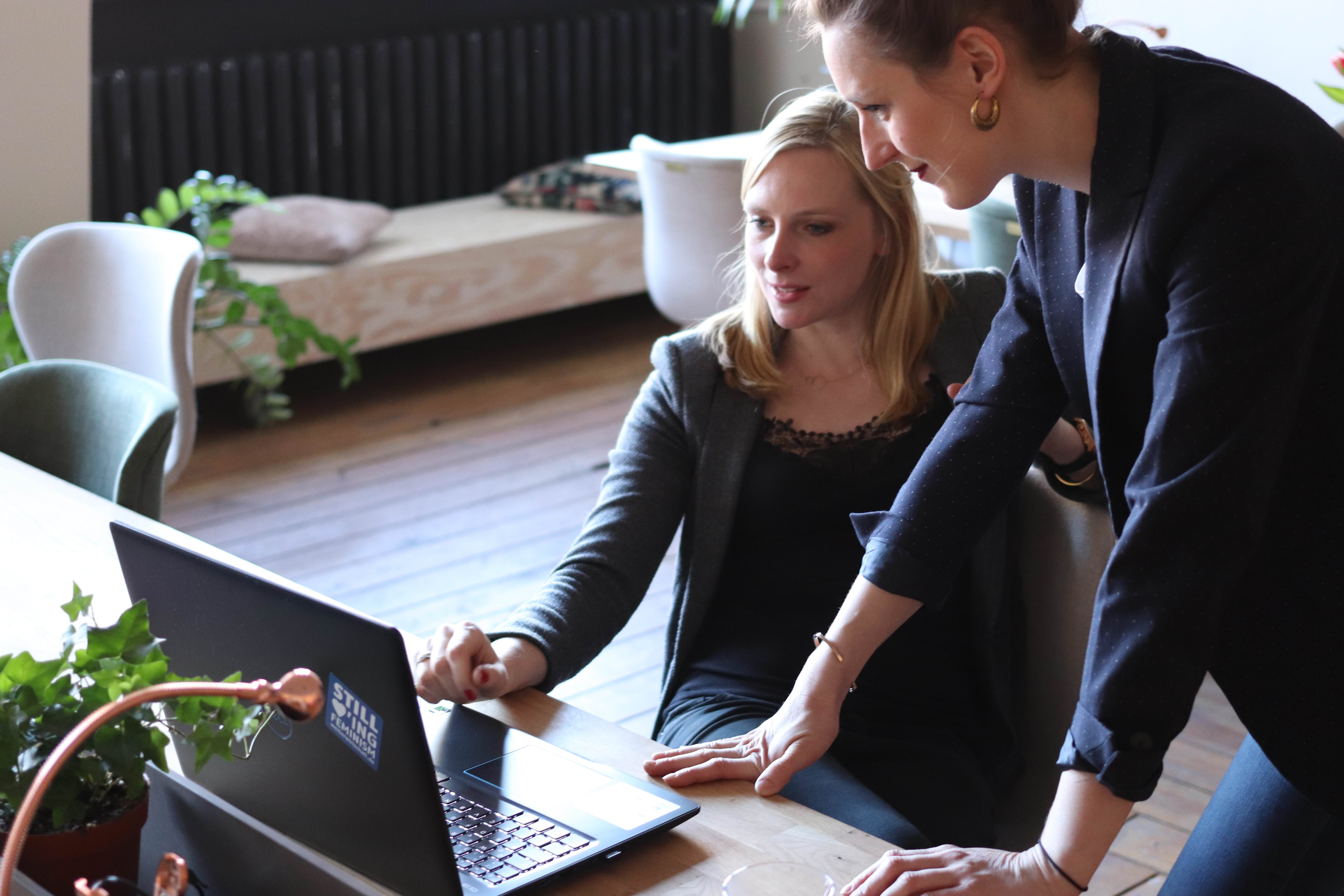 Picture of women by computer servant leadership